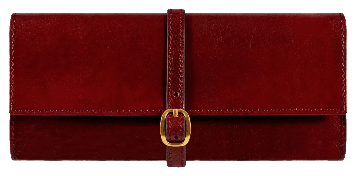 Viaggio Roll closed: a burgundy leather travel case fastened with a brass buckle.